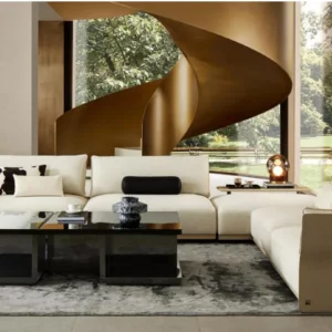 Salon avec canapé modulable en tissu clair et escalier hélicoïdal, catalogue haut de gamme