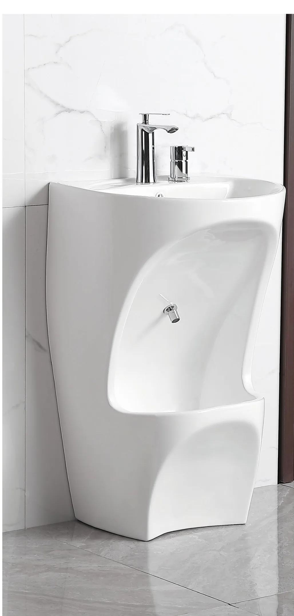 Vasque sur colonne en céramique blanche dans une salle de bain, extrait de notre catalogue de sanitaires